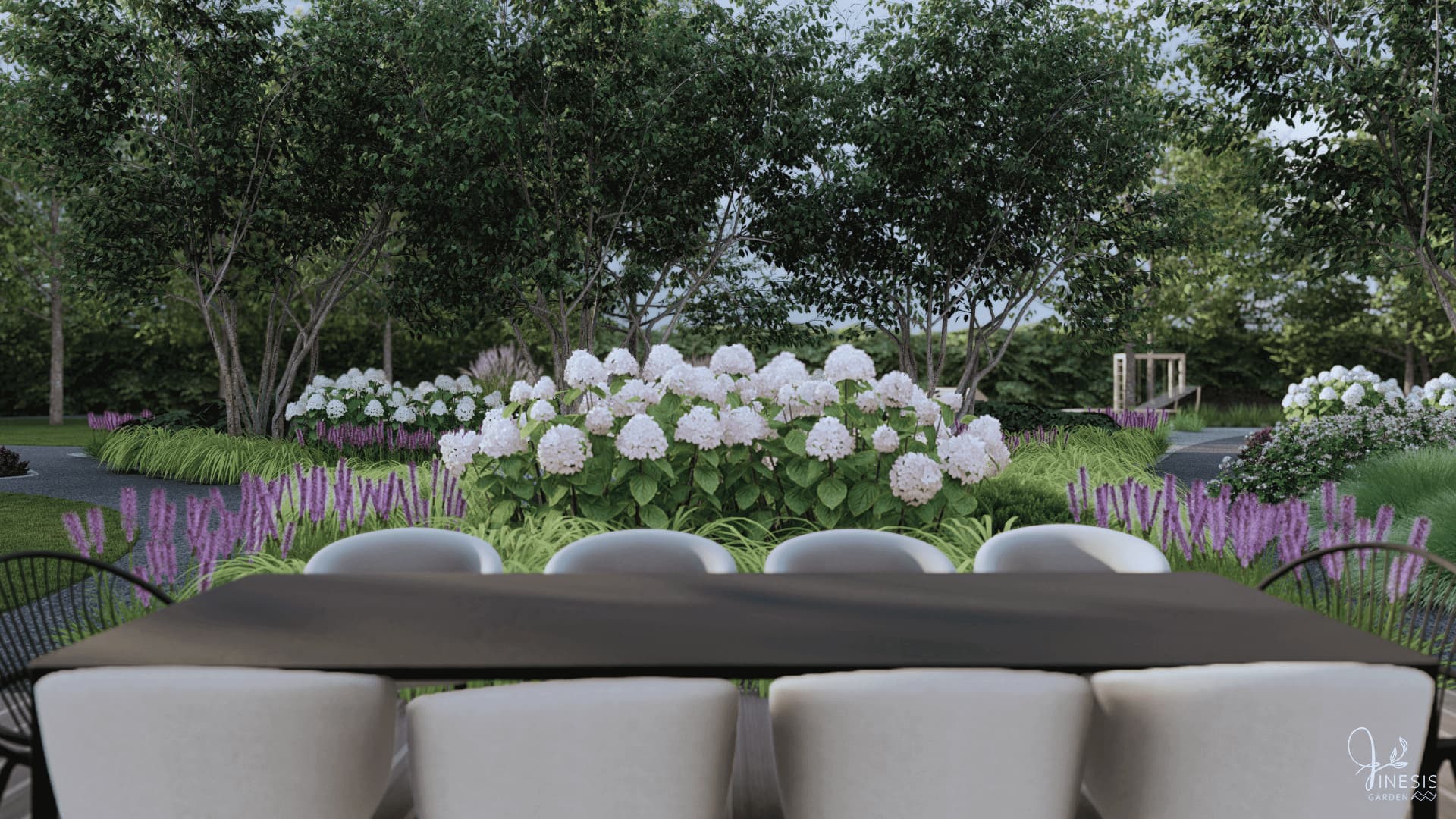 projekt ogrodu Włocławek - widok na kwitnącą rabatę bezpośrednio przy tarasie - rabata z białych hortensji